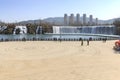 Tourists wisiting the Kunming Waterfall park featuring a 400 meter wide manmade waterfall. Kunming is Yunnan's capital