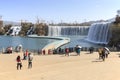 Tourists wisiting the Kunming Waterfall park featuring a 400 meter wide manmade waterfall. Kunming is Yunnan's capital