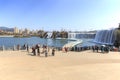 Tourists wisiting the Kunming Waterfall park featuring a 400 meter wide manmade waterfall. Kunming is Yunnan's capital