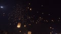 Touristy floating sky lanterns in Yee-Peng festival , Chiang Mai ,Thailand