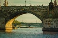 Prague, Czech Republic - September , 17, 2019: Tourists walking trought Charles Bridge, view from Vltava river level