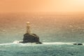 Tourlitis lighthouse in Andros island in Greece. Golden hour.