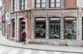 Tournai Doornik, Walloon Region - Belgium - A nun walking through the residential Streets of old town