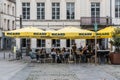 Tournai Doornik, Walloon Region - Belgium - People sitting on Sunny terraces of Ricard at a city square