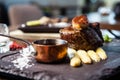 Tournedos Rossini. Foie gras, Black Angus beef tenderloin, white asparagus, red wine sauce. Delicious healthy Royalty Free Stock Photo