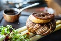 Tournedos Rossini. Foie gras, Black Angus beef tenderloin, white asparagus, red wine sauce. Delicious healthy Royalty Free Stock Photo