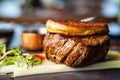 Tournedos Rossini. Foie gras, Black Angus beef tenderloin, white asparagus, red wine sauce. Delicious healthy Royalty Free Stock Photo