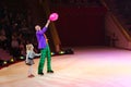 Tours of Moscow Circus on Ice. Clown with balloon and little girl on stage