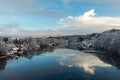 Kristiansand, Norway - January 17, 2018: Scenic view of the Tovdal River at Tveit, with houses by the riverside. Winter