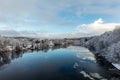 Kristiansand, Norway - January 17, 2018: Scenic view of the Tovdal River at Tveit, with houses by the riverside. Winter