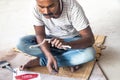 TOVP, Mayapur. West Bengal, India. - Dec 16, 2019. artisan working on sculpture on the building of the Temple of the