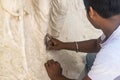 TOVP, Mayapur. West Bengal, India. - Dec 16, 2019. craftsman working in plaster