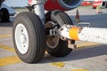 Tow bar and nosewheel Royalty Free Stock Photo