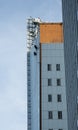 Tow man hanging on ropes at a building