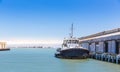 Tow ship in harbor of seaport.