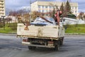 Tow Truck. A car tow truck transports a damaged car through the city streets Royalty Free Stock Photo