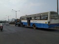 Tow truck delivers the damaged BMTC Bus, Repair and recovery vehicle towing a broken city bus