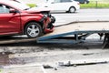 Tow truck for emergency car move. The car after the accident is loaded on a tow truck Royalty Free Stock Photo