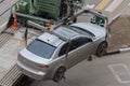 Tow truck loads the car for violation of the parking rules. Fix Royalty Free Stock Photo