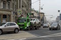 Tow truck `Moscow Parking` carries the car to the impound lot.