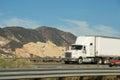 Tow truck and other vehicle circulating on Interstate Freeway 5 Royalty Free Stock Photo