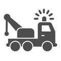 Tow truck solid icon. Vehicle salvage with crane and signal sirene symbol, glyph style pictogram on white background