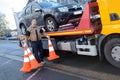 Tow truck takes away broken car Royalty Free Stock Photo