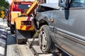 Tow truck towing a broken down car in emergency Royalty Free Stock Photo