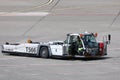 Towing truck on the runway, airport Royalty Free Stock Photo