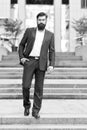 Toward business achievements. Conquer business world. Office worker confidently step on stairs. Bearded man going to Royalty Free Stock Photo