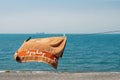 Towel hanging on the rope on the beach