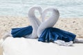 Towel Origami of Swans in a Heart Shape at a Beach Spa