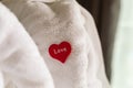 Towel white and symbol of love hearts red decor in a room cleanliness newlyweds Royalty Free Stock Photo