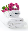 Towels and a bouquet of roses Royalty Free Stock Photo