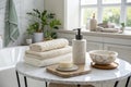 Towels and ceramics on marble table in bathroom Royalty Free Stock Photo