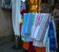 Towels displayed for sale with the Portofino logo, in Portofino, Genoa province, Italy