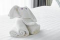 Towels in elephants shape on white bed Comfortable soft Royalty Free Stock Photo
