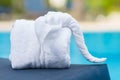 Towels in form of elephants on sunbed at luxury swimming pool Royalty Free Stock Photo