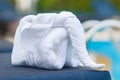 Towels in form of elephants on sunbed at luxury swimming pool Royalty Free Stock Photo