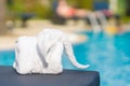 Towels in form of elephants on sunbed at luxury swimming pool Royalty Free Stock Photo