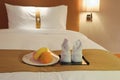 Towels and fruit on bed Royalty Free Stock Photo