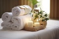 Towels, Herbal Bags, and Beauty Treatments in a Tranquil White Room Setting at the Spa Center. created with Generative AI