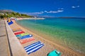 Towels on idyllic beach in Kastela bay