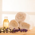 Towels lavender and masage oil on a table in spa salon Royalty Free Stock Photo