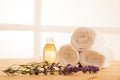 Towels lavender and masage oil on a table in spa salon Royalty Free Stock Photo