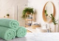 Towels on marble table in bathroom. Space for text Royalty Free Stock Photo