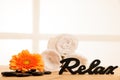 Towels and masage rocks on table in spa salon Royalty Free Stock Photo