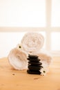 Towels and masage rocks on table in spa salon Royalty Free Stock Photo