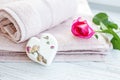 Towels and salt for bath and rose. Place for the inscription. Th Royalty Free Stock Photo