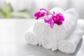 Towels on table with copy space blurred bathroom background. Royalty Free Stock Photo